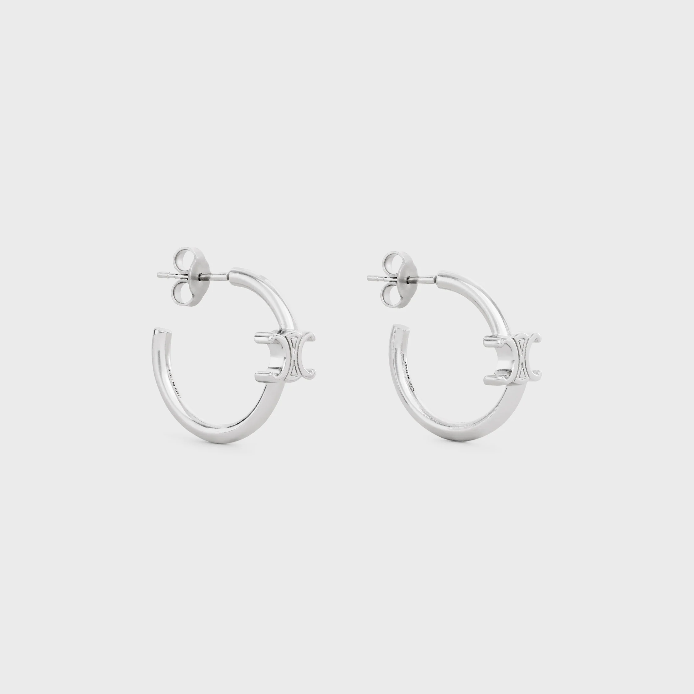 Boucles d'oreilles asymétriques Triomphe en laiton avec finition rhodiée