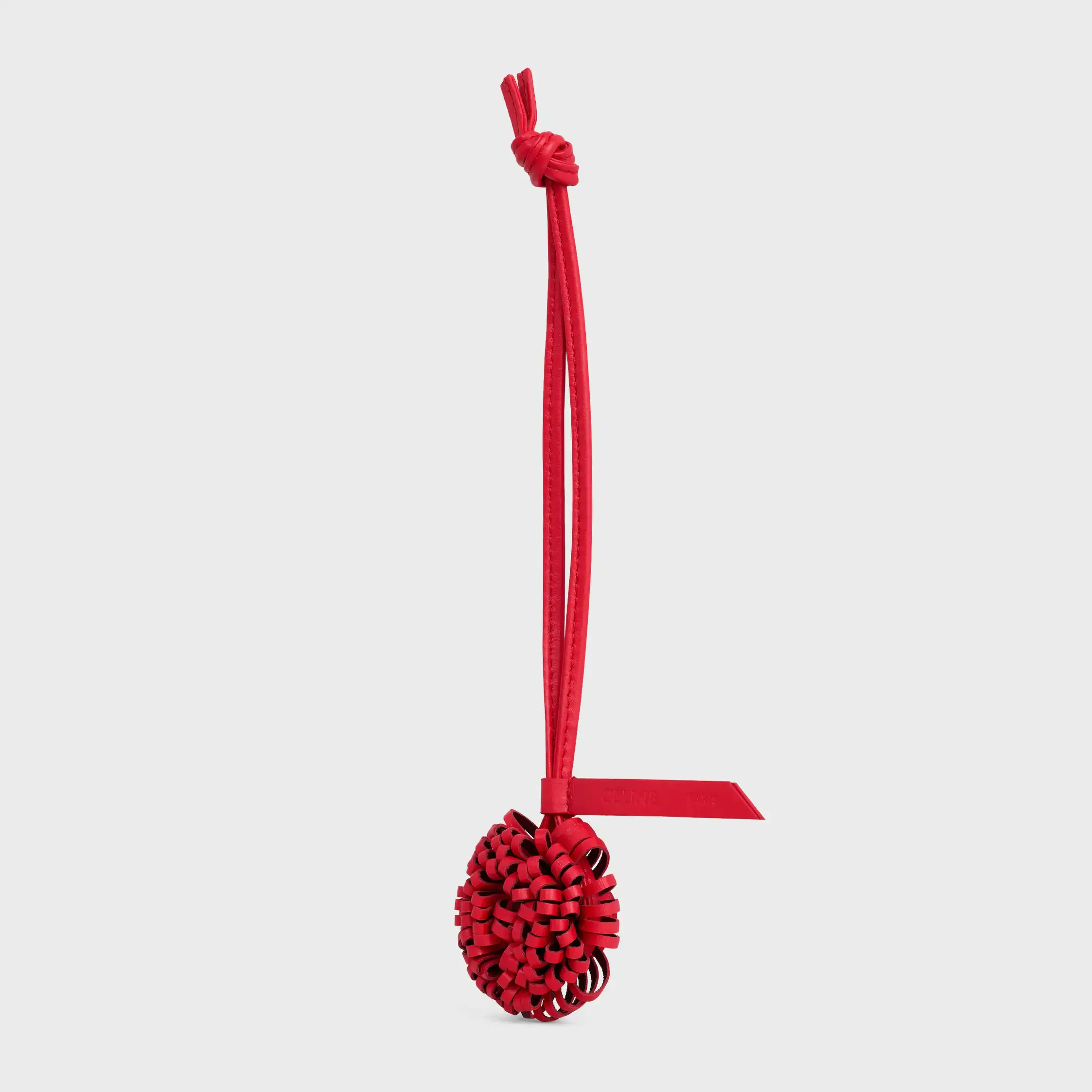 PENDENTIF PÂTISSE EN PEAU DE MOUTON LISSÉE