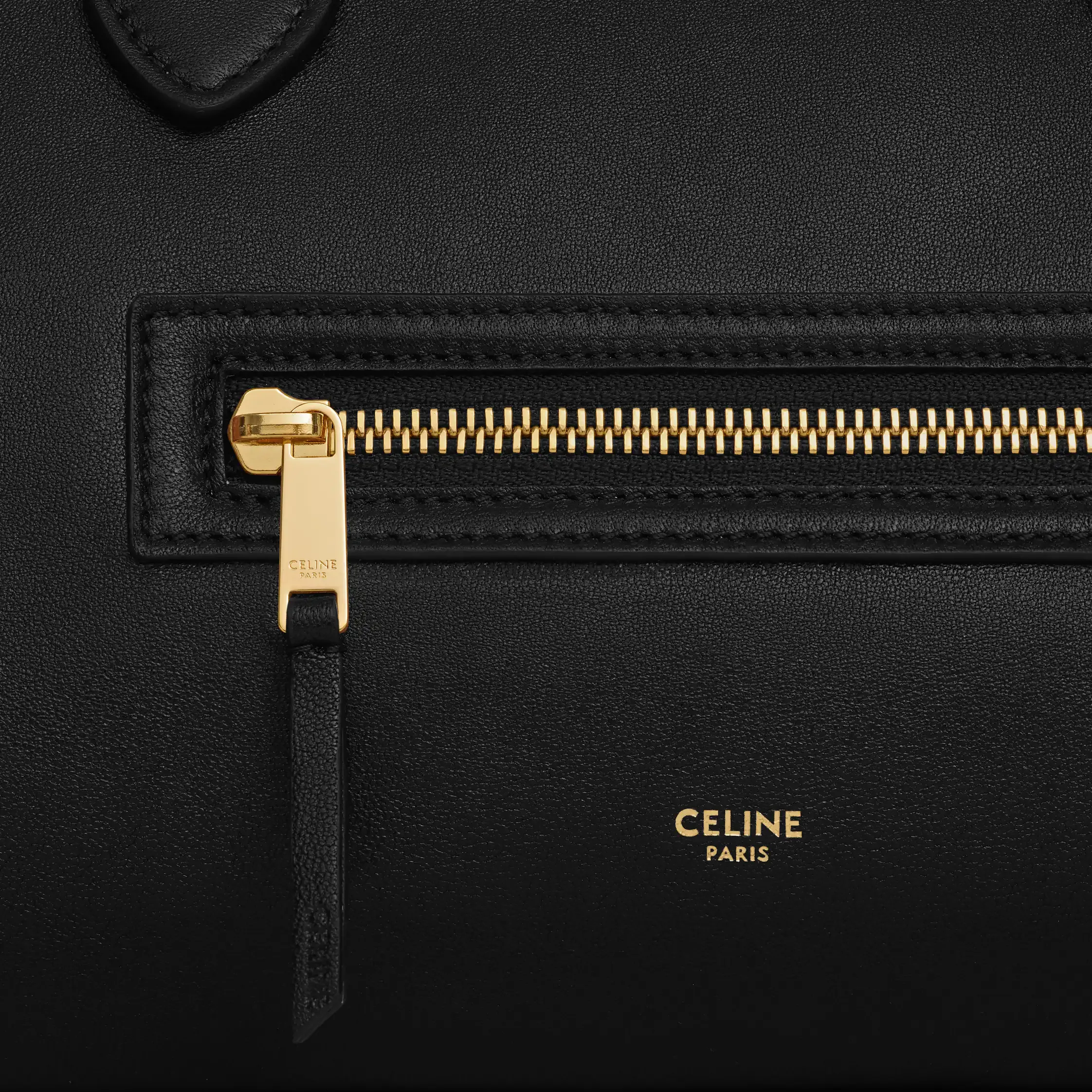 VALISE EN PEAU DE MOUTON SOUPLE ET BRILLANTE