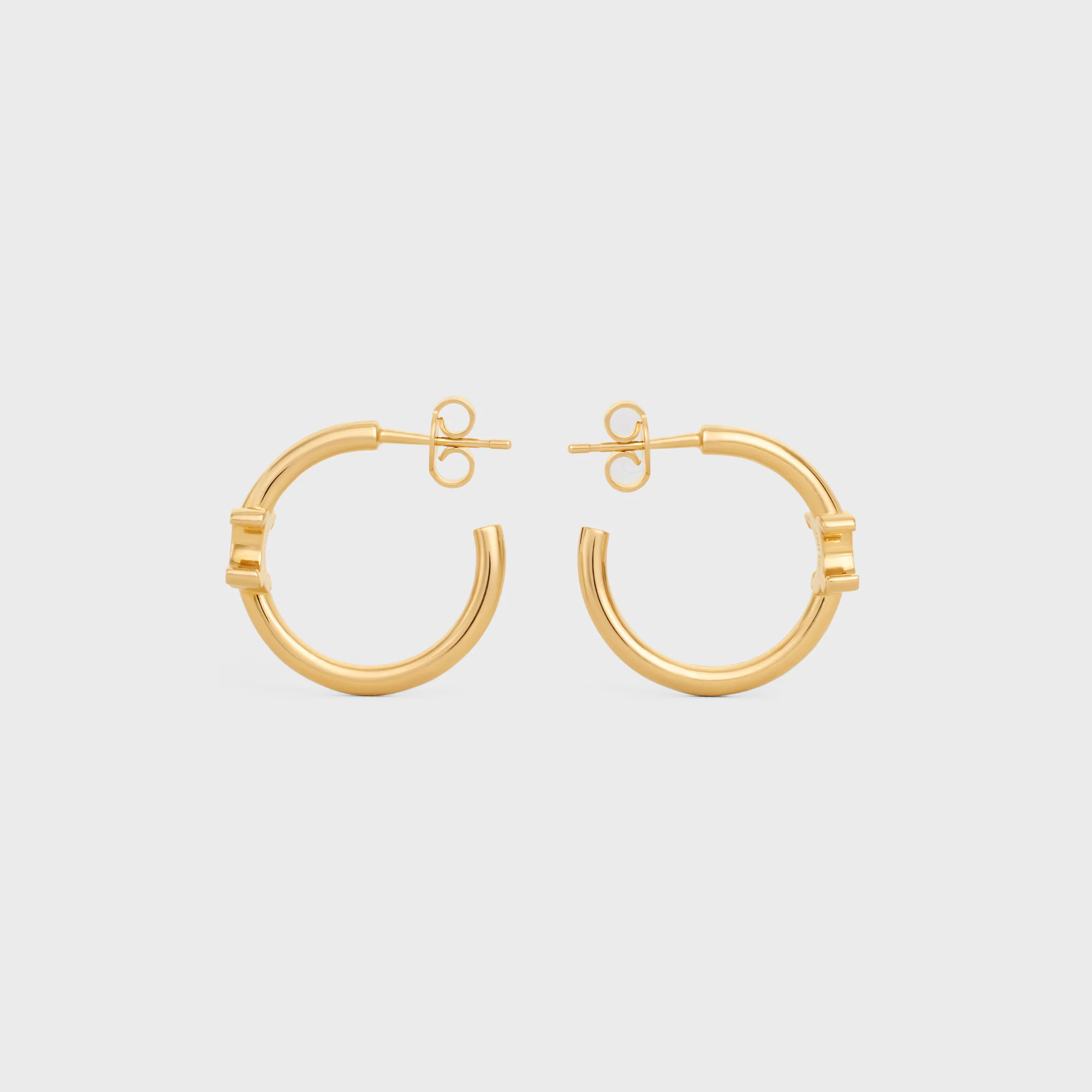Boucles d'oreilles asymétriques Triomphe en laiton finition or