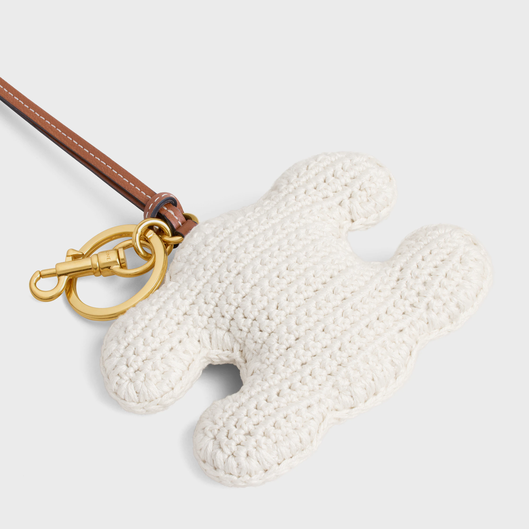 TRIOMPHE porte-clés en crochet de coton avec finition dorée