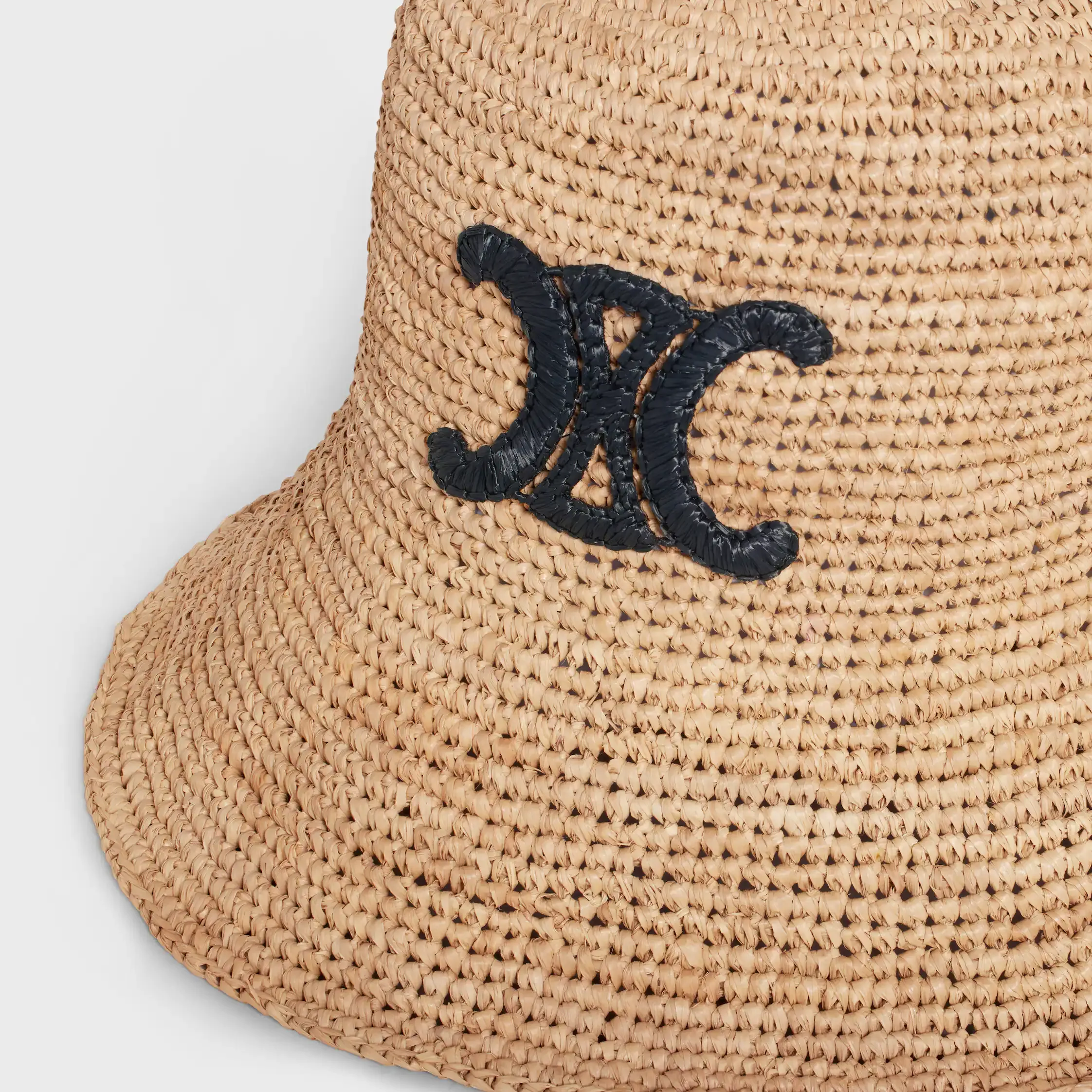chapeau melon triomphe en raphia