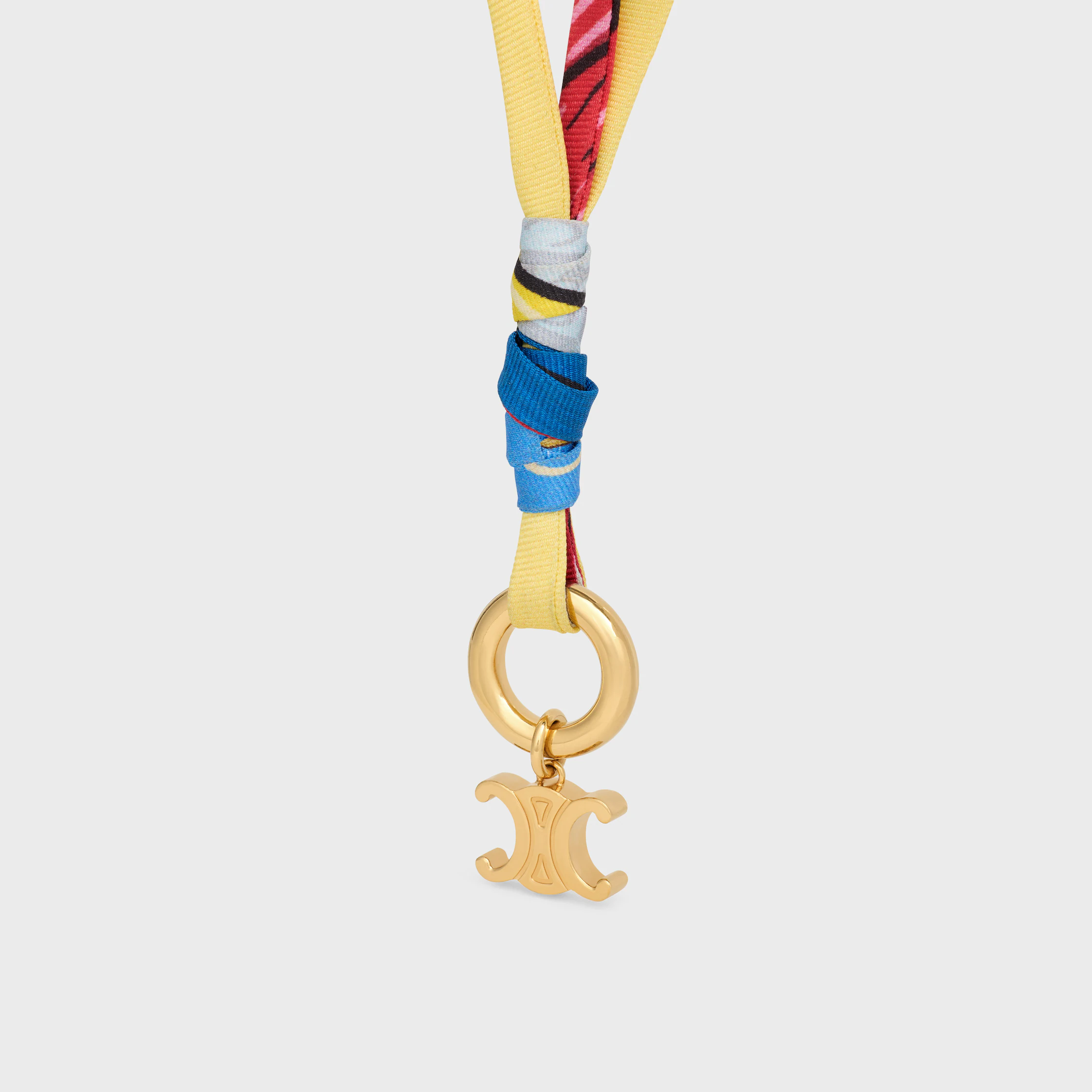 Collier à breloques Celine en soie et laiton avec finition or