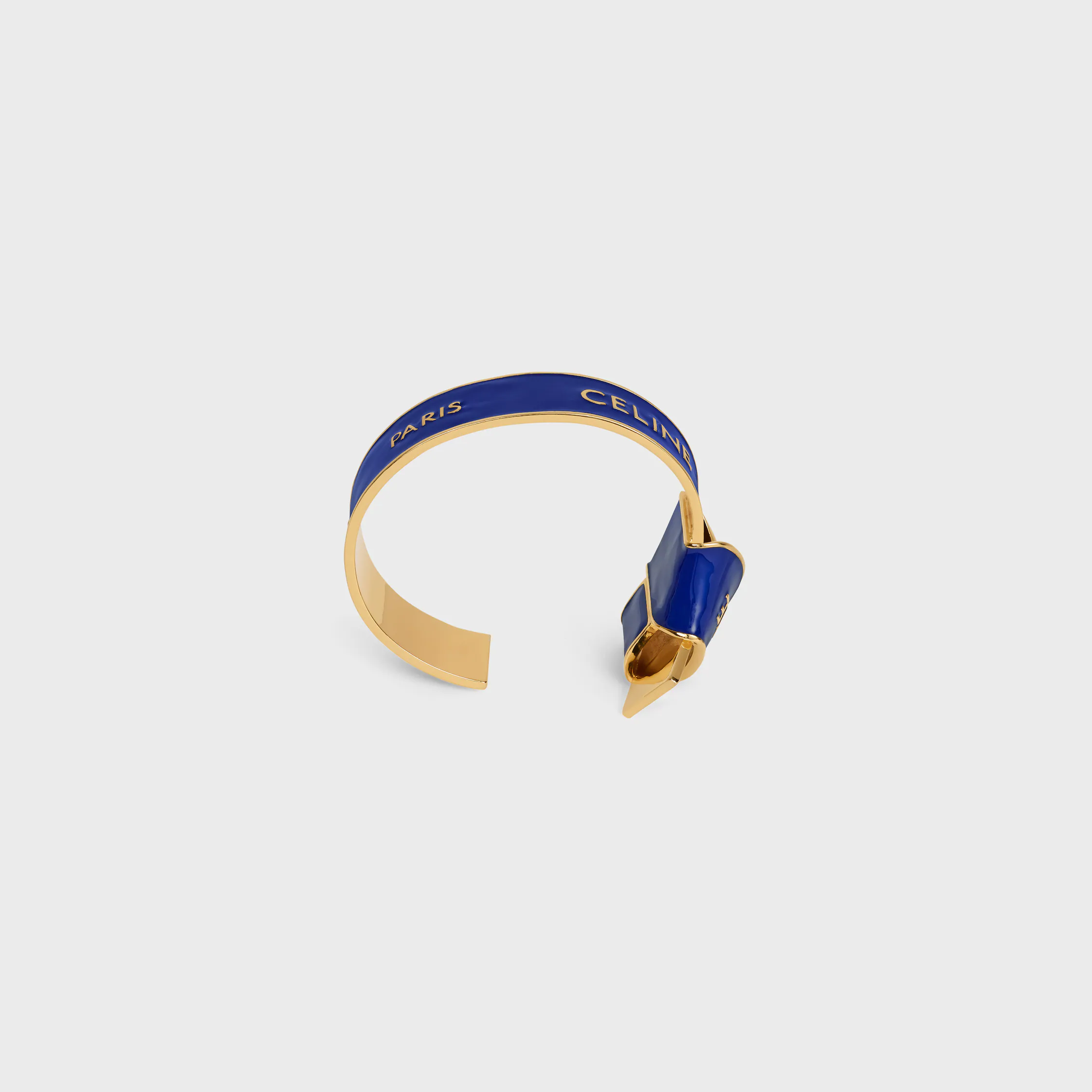 Cuff noué Celine à ruban en émail et laiton avec finition or