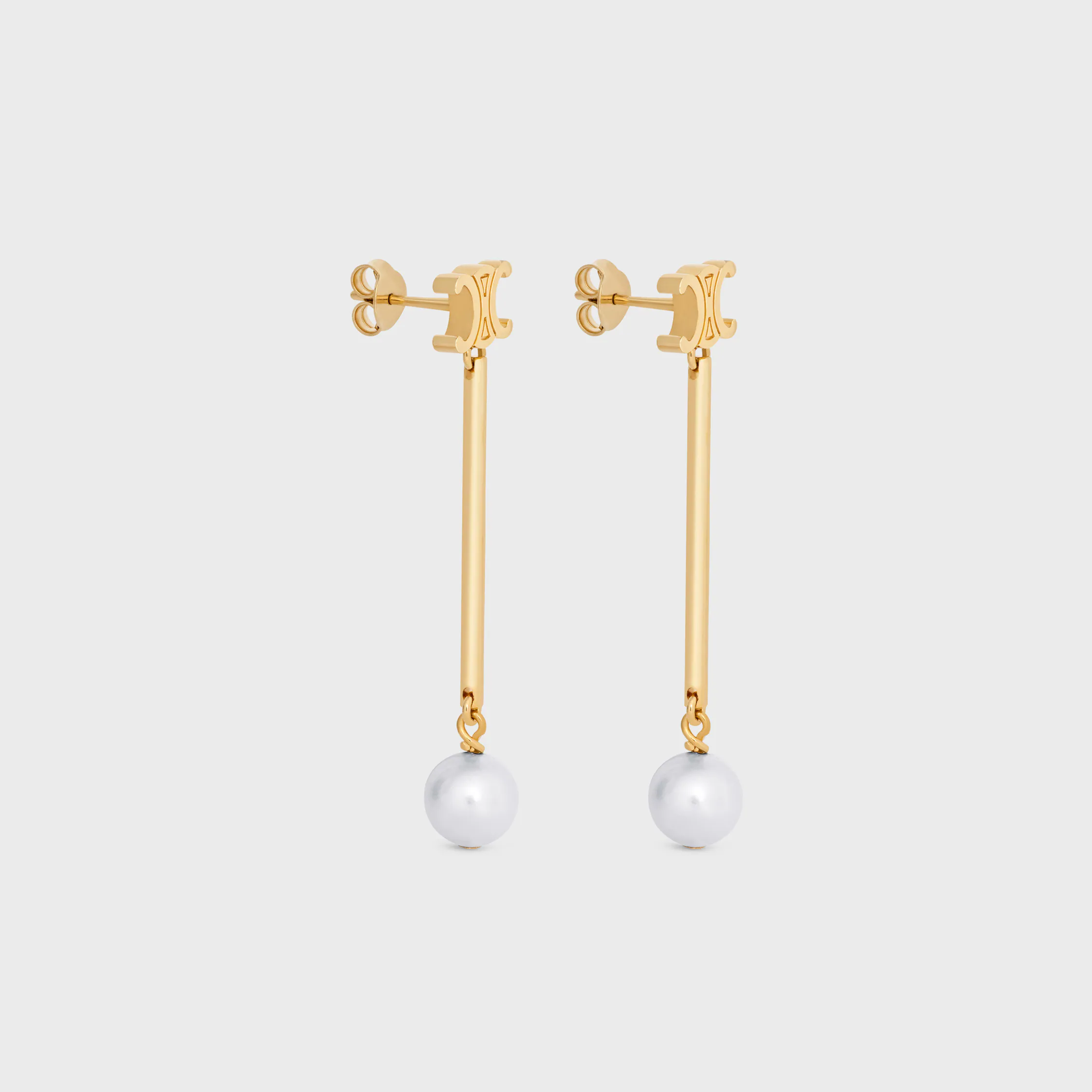Les boucles d'oreilles droites Celine en perles de résine et laiton finition or