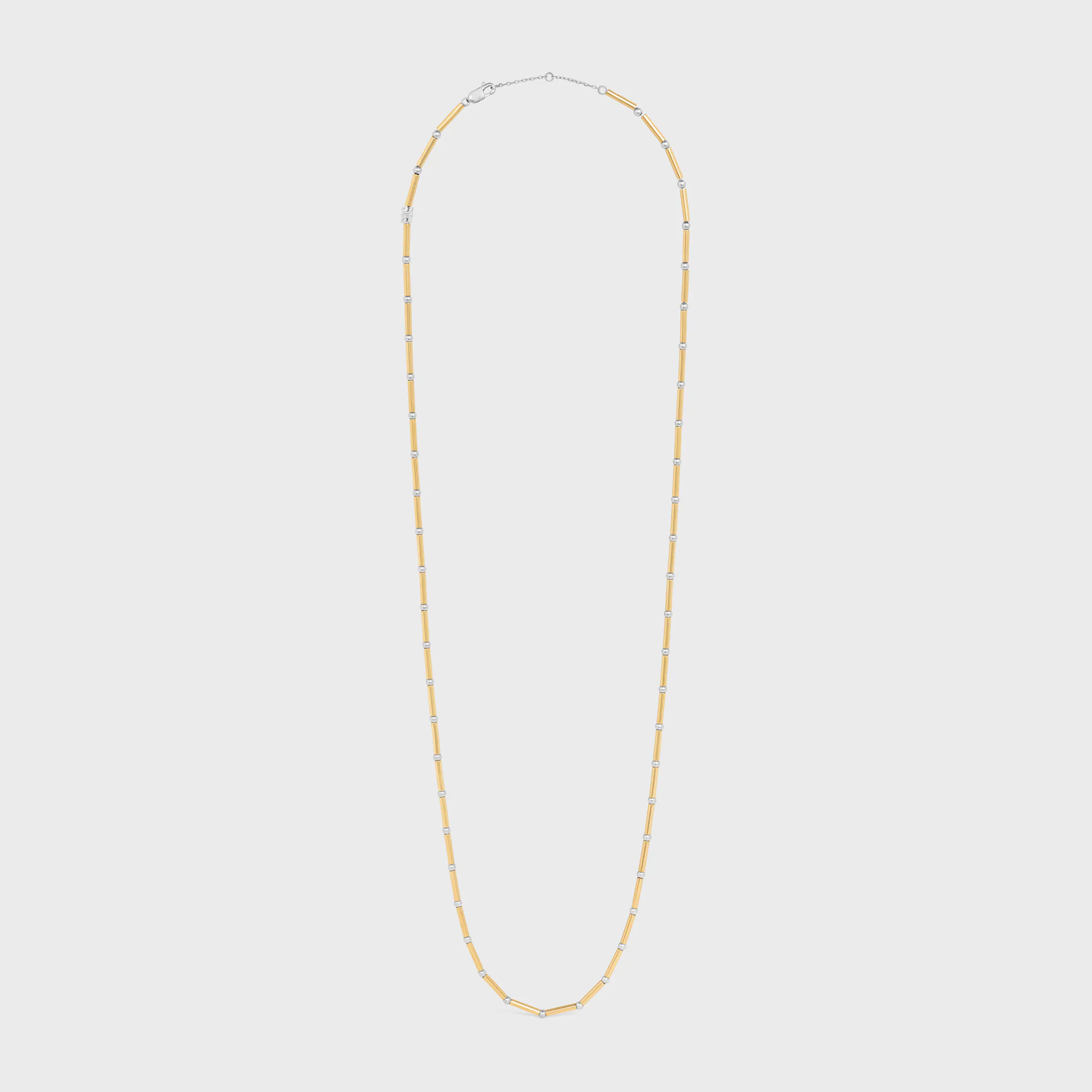 COLLIER LONG EN LAiton AVEC FINITIONS OR ET RHODIUM