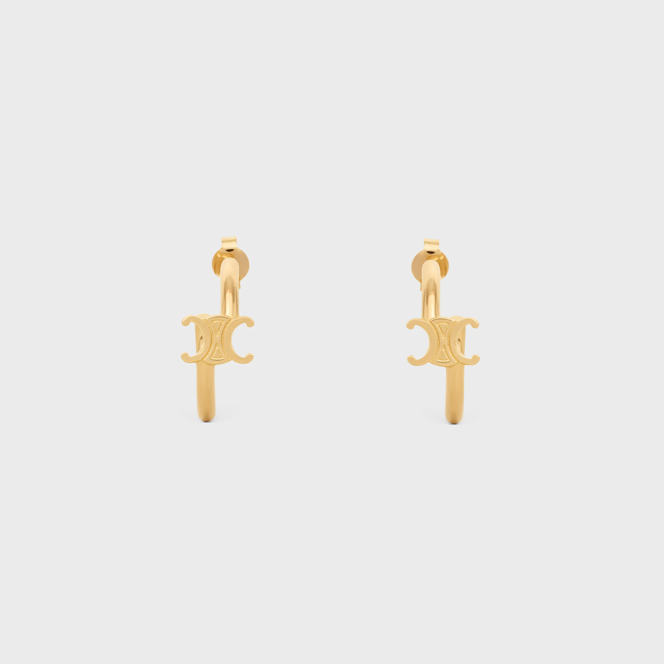 Boucles d'oreilles asymétriques Triomphe en laiton finition or