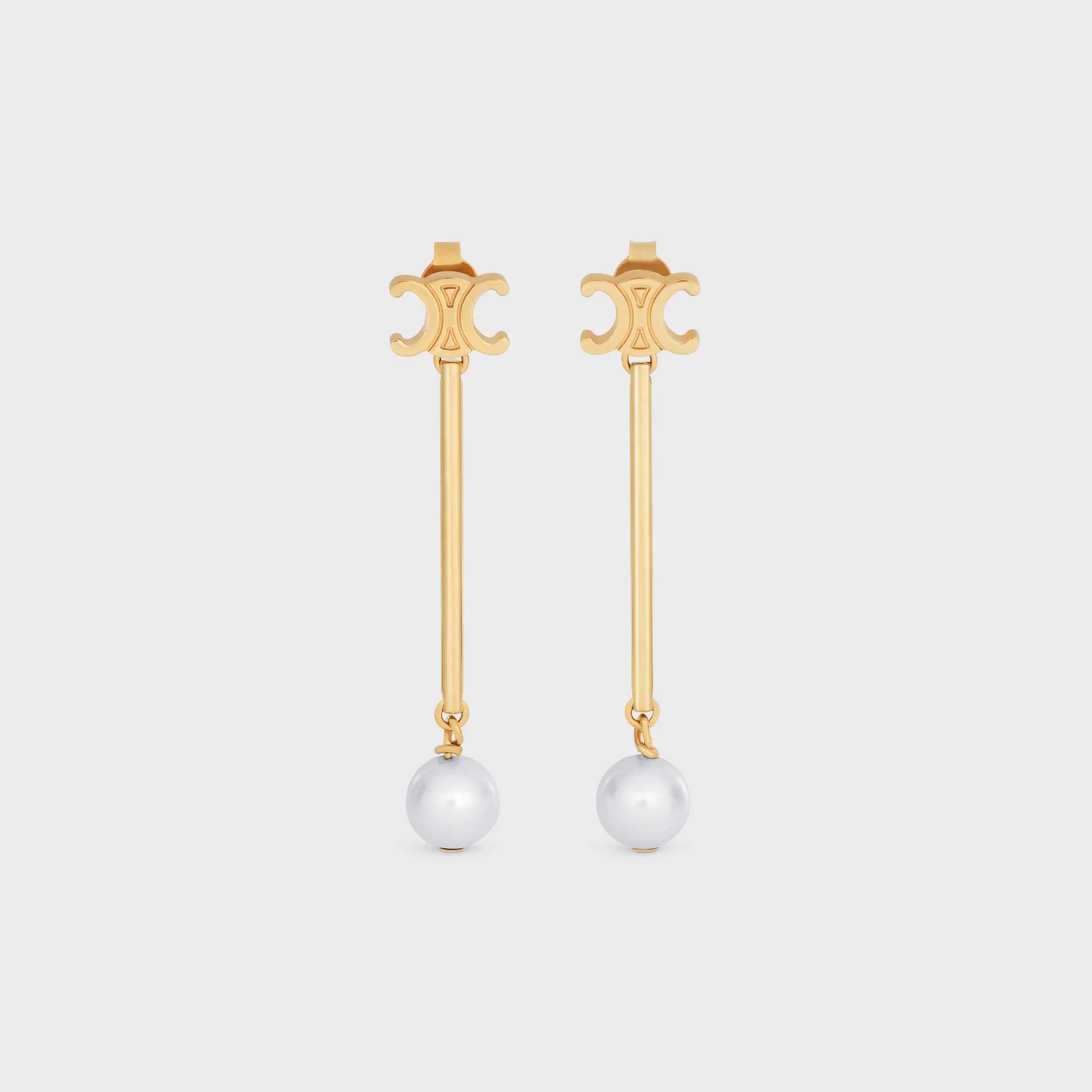 Les boucles d'oreilles droites Celine en perles de résine et laiton finition or