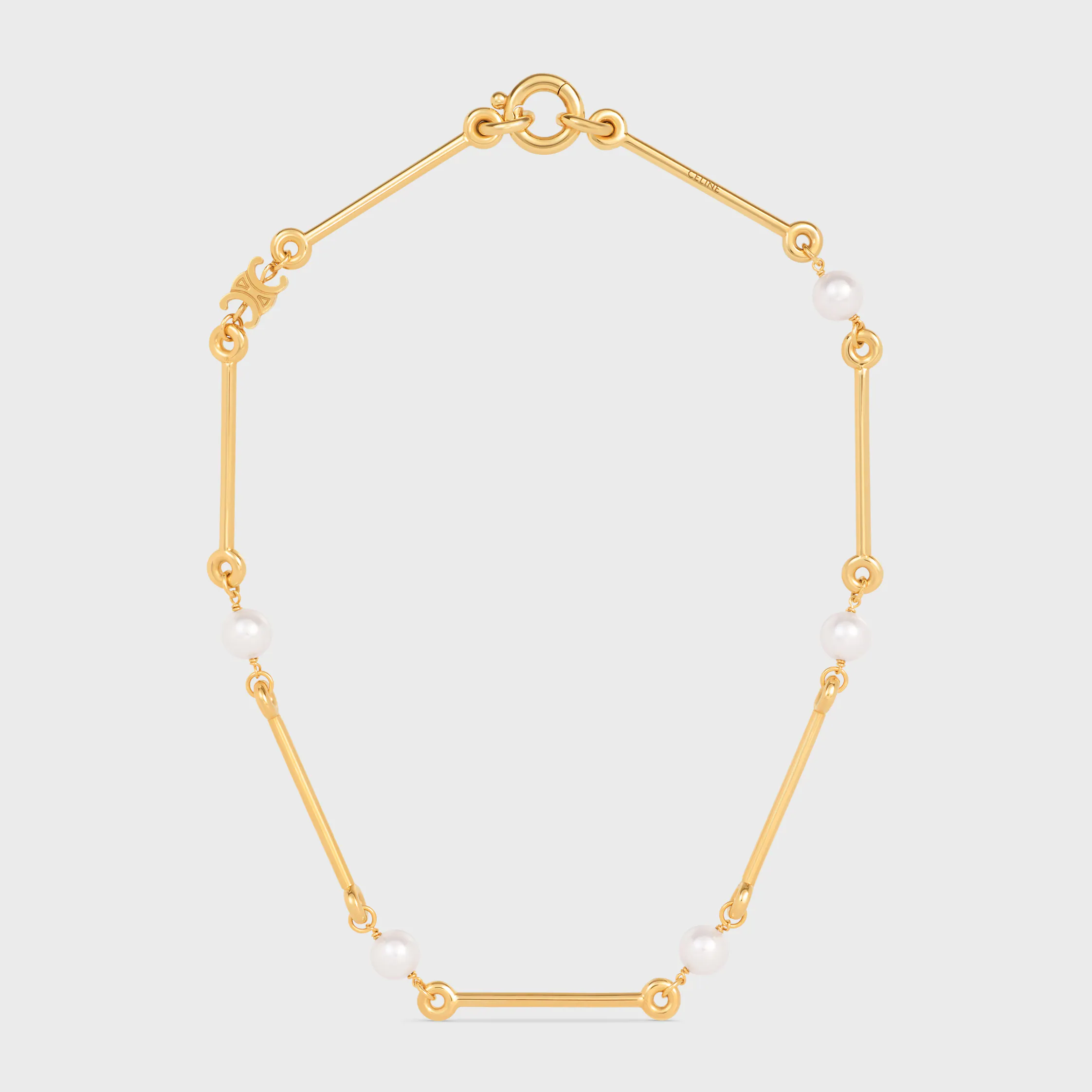 Le collier droit Celine en perles de résine et laiton fini or