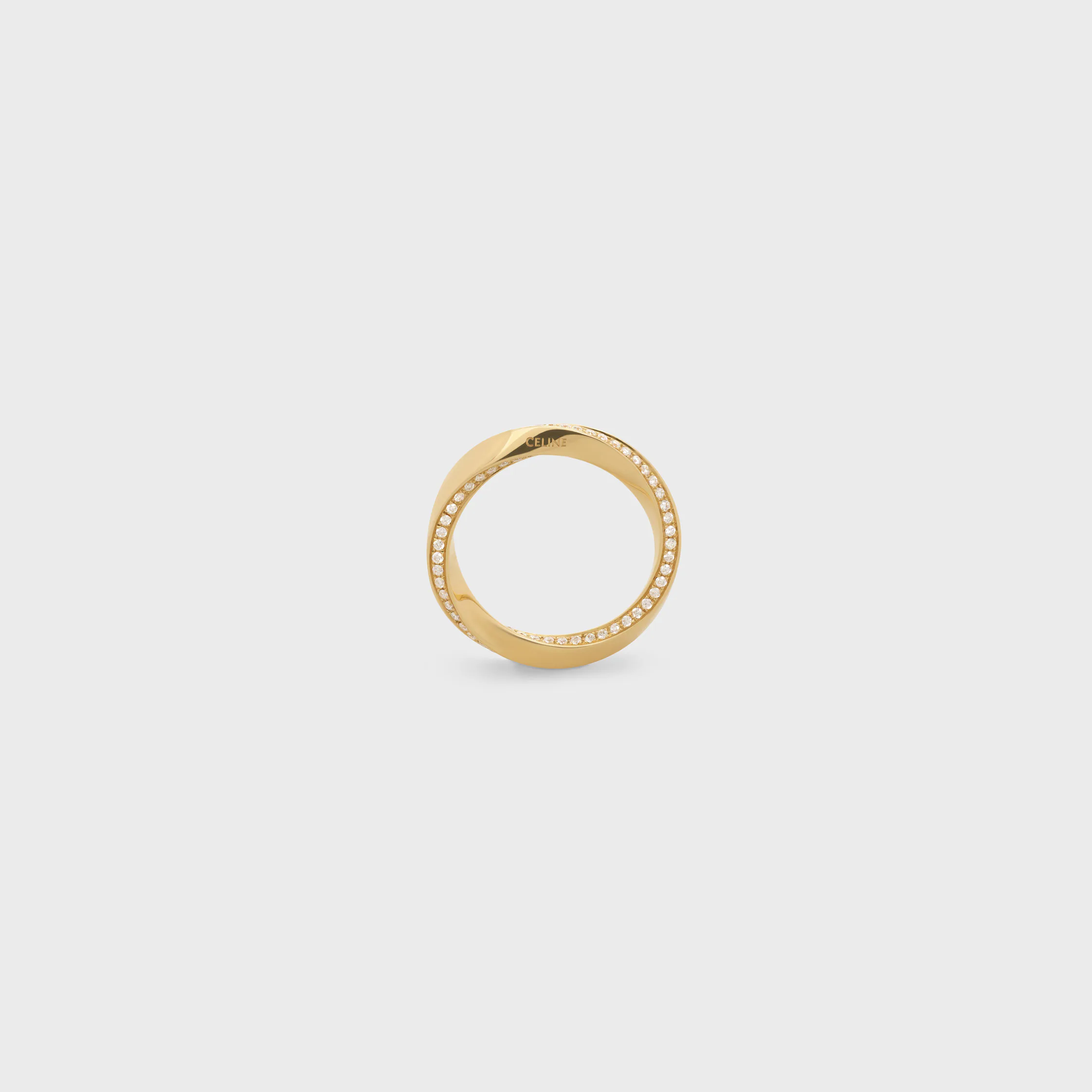 Anneau torsion en or jaune et diamants