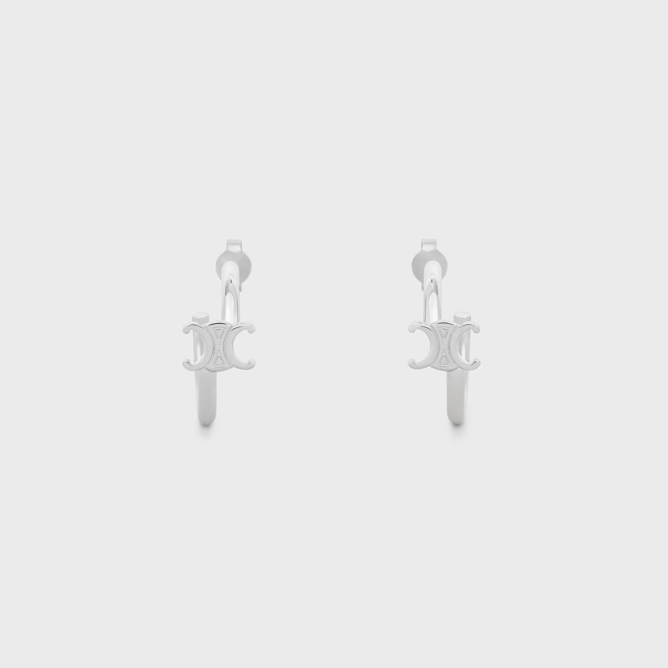 Boucles d'oreilles asymétriques Triomphe en laiton avec finition rhodiée