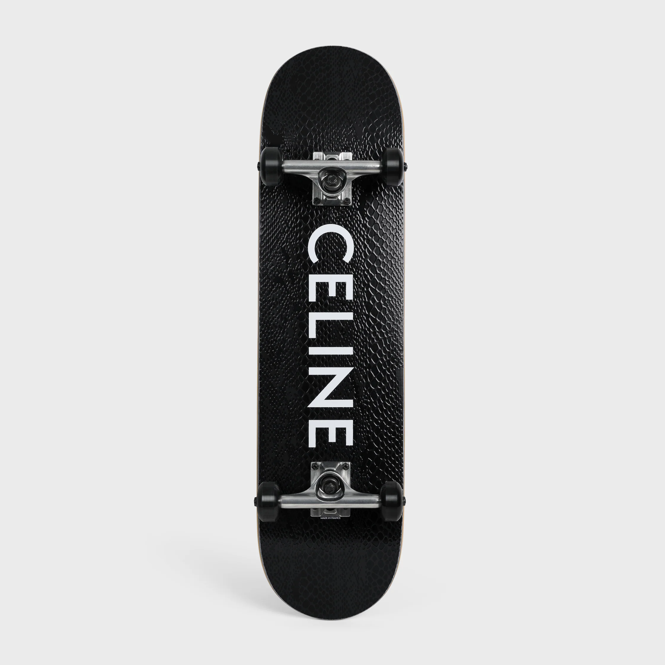 SKATEBOARD À IMPRIMÉ TEXTURÉ SERPENT ET CELINE