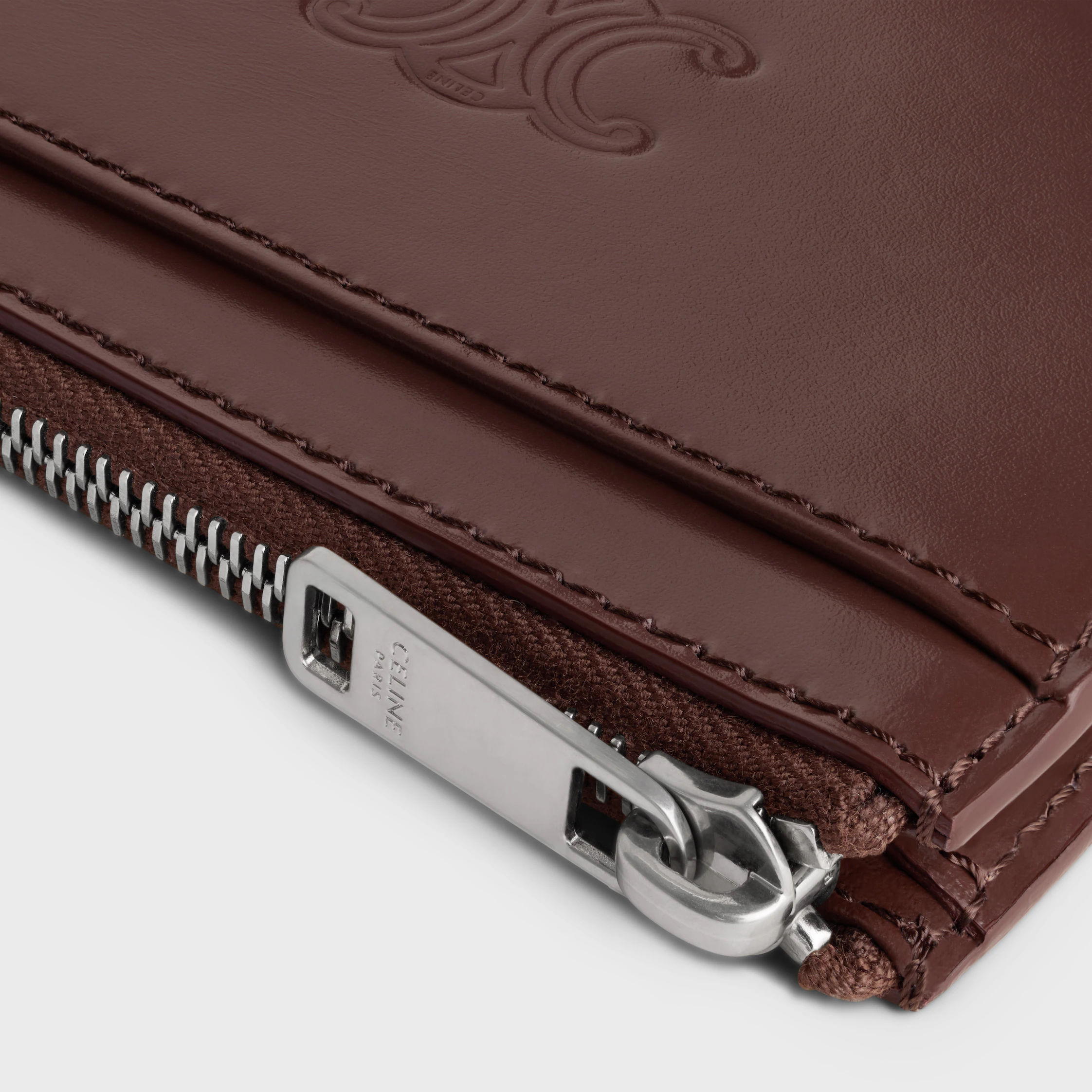 Porte-cartes zippé en cuir de veau satiné avec motif triomphe