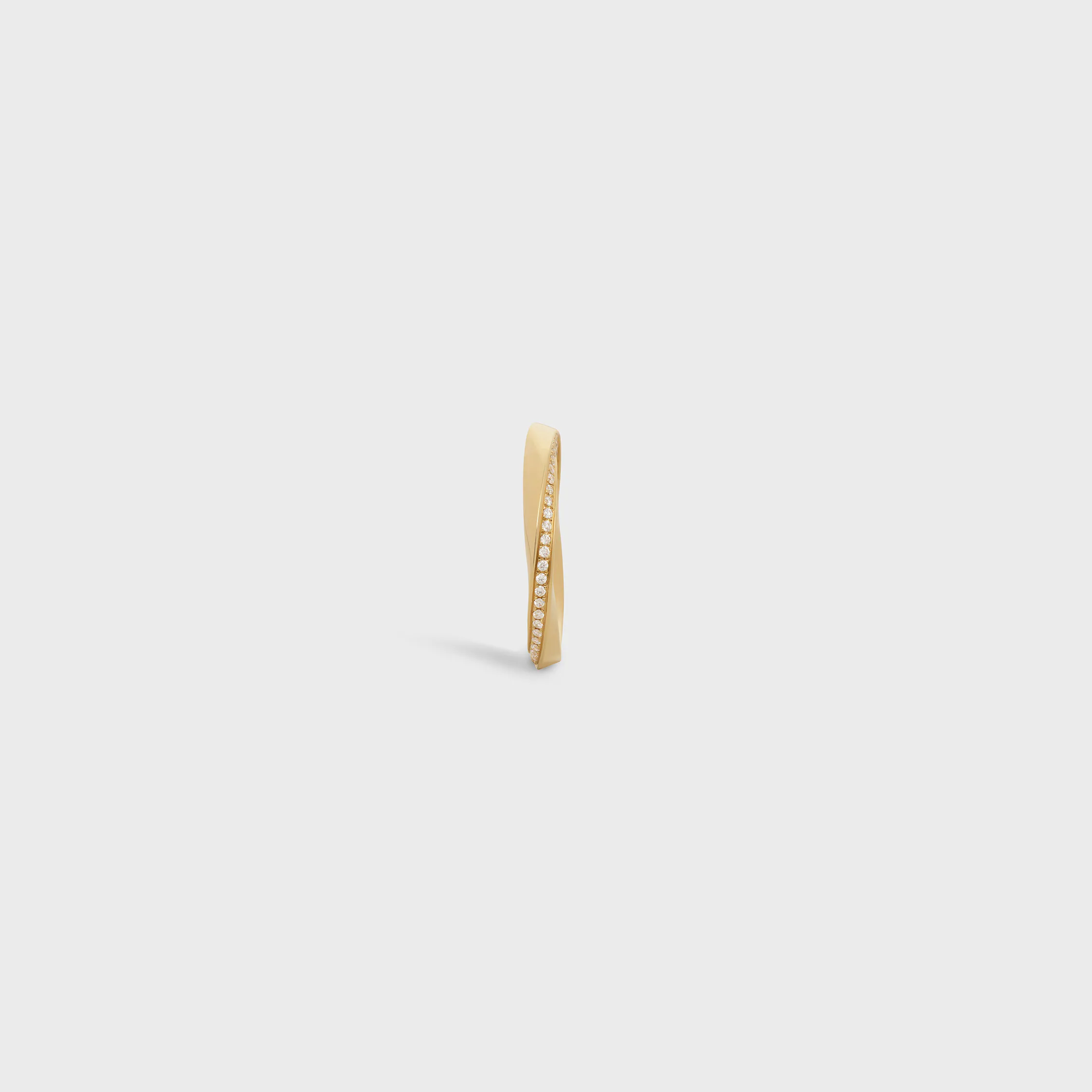 Anneau torsion en or jaune et diamants