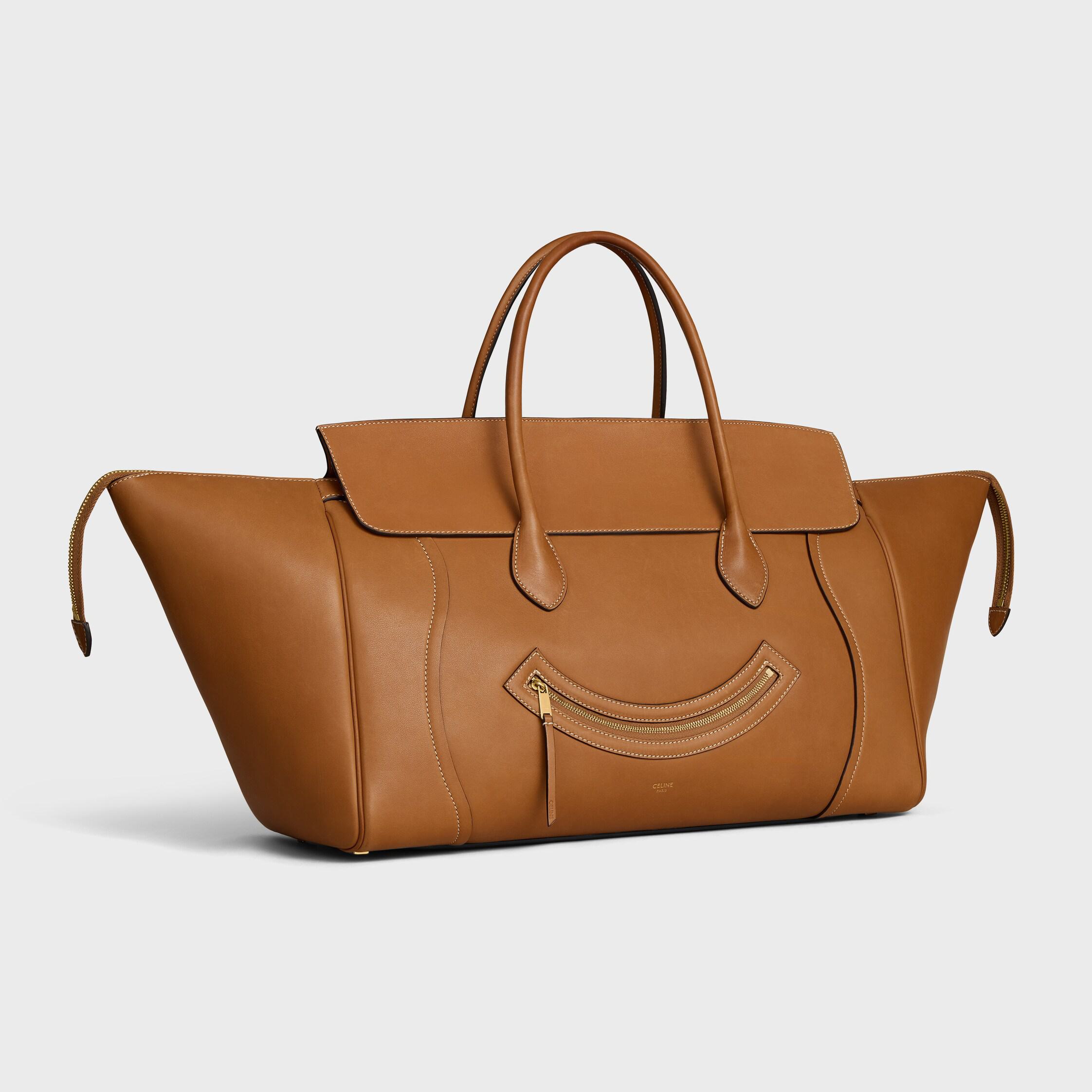 VALISE BIG SMILE EN CUIR DE VEAU NATUREL SOUPLE