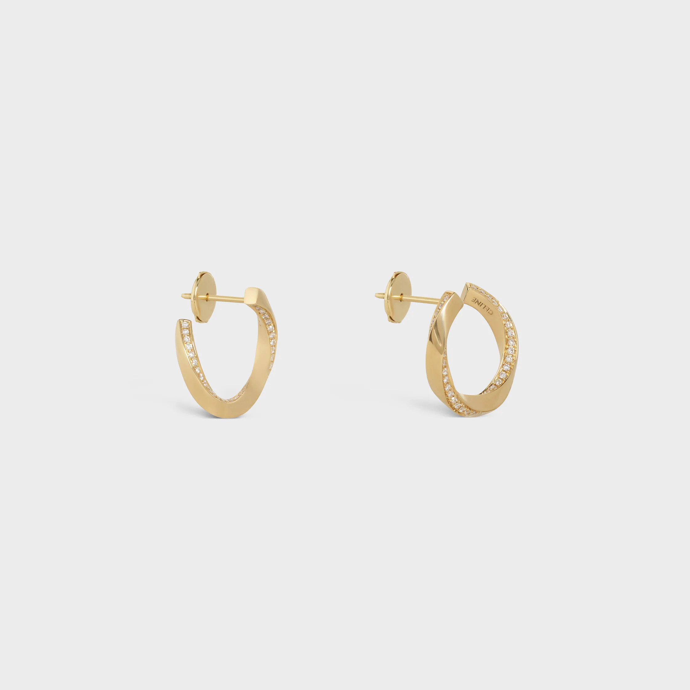 Boucles d'oreilles torsion en or jaune et diamants